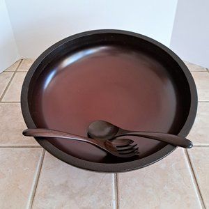 Large wooden bowl with servers.